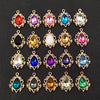 A collection of gold-plated water droplet charms featuring various colored crystal rhinestones arranged in a flower shape.