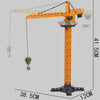 An orange diecast construction crane model toy set with a yellow jib and hook, shown against a gray background.