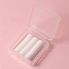 Clear plastic box containing several white gradient rotating dotting pens for nail art and rhinestone application