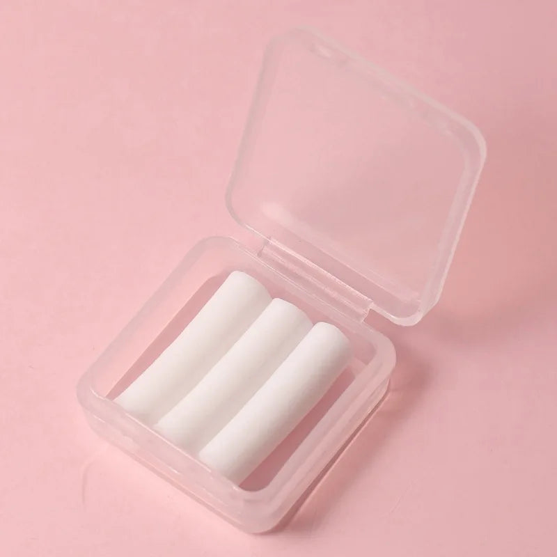 Clear plastic box containing several white gradient rotating dotting pens for nail art and rhinestone application