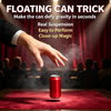 A hand is floating a red aluminum can above a red velvet cloth, demonstrating a magic trick.