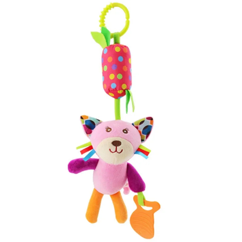 A pink plush animal toy with a yellow loop, designed as a hanging baby item.
