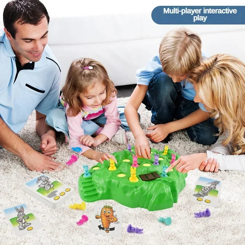 A family playing a green rabbit trap puzzle game on the floor with various colored pieces.