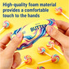 Hands hold a yellow butter squishy stress relief toy with colorful swirls on a yellow background.
