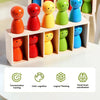 A wooden toy set featuring colorful figures arranged in compartments for concentration and cognitive training.