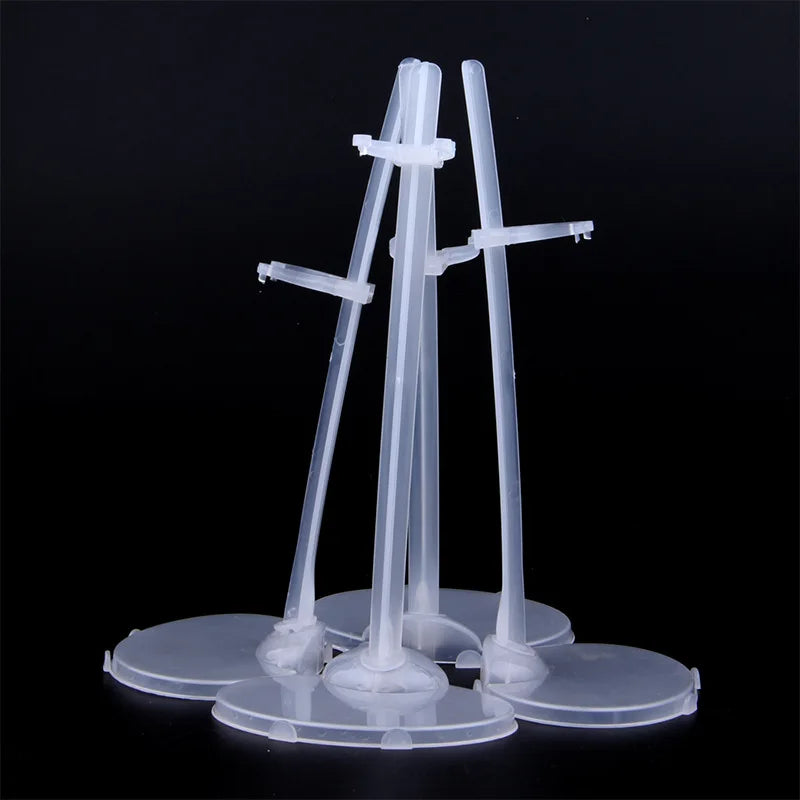 A transparent doll display stand with a waist clip, featuring two vertical rods and a base.