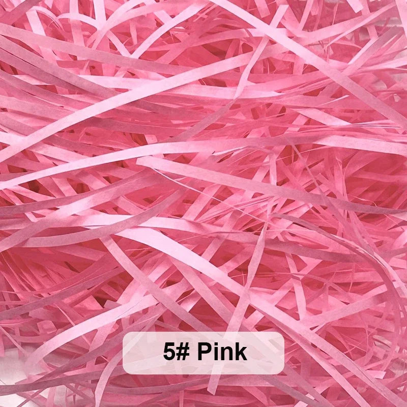 Pink raffia paper shreds used for gift boxes and baskets