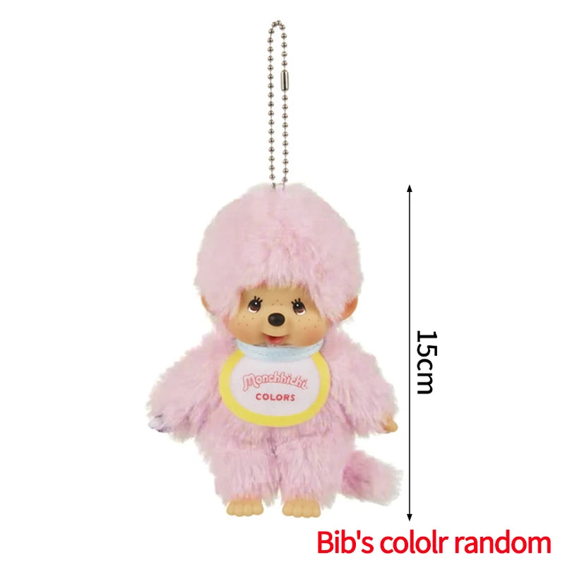 Pink fluffy plush cartoon keychain charm with a silver chain and a yellow tag