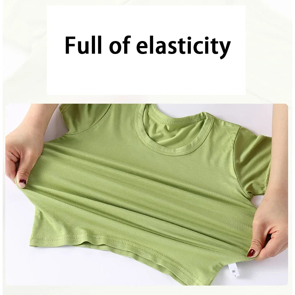 A lime green short sleeve t-shirt and matching shorts for a kid's pajama set.