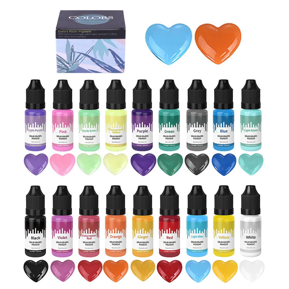 A set of vibrant candle dye pigment colors including heart-shaped samples and various glass bottles.