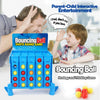 A blue bouncing ball shots board game is shown with a father and child playing, demonstrating strategy and thinking.