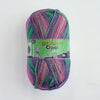 A ball of 100g Opal 4-ply sock yarn in shades of pink, green, and purple.