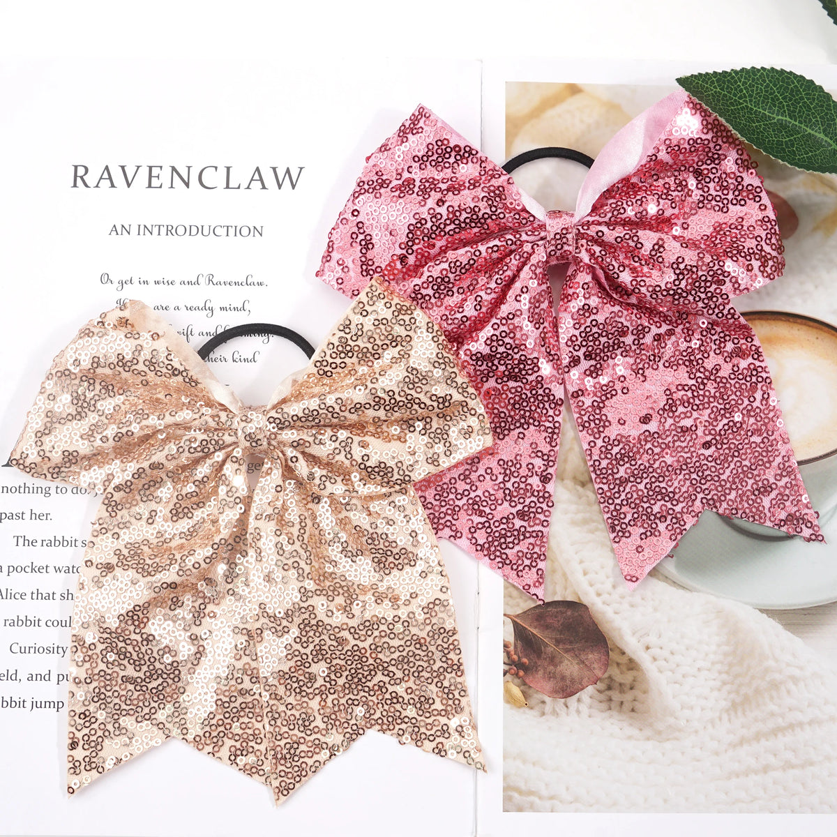 Pink and rose gold glitter sequin pigtail bows for girls displayed on a white background.