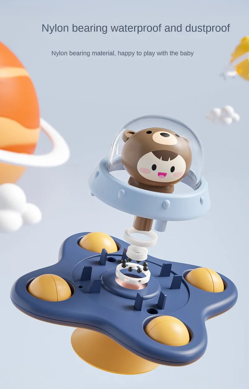A set of three silicone suction cup spinner bath toys for babies, featuring a brown bear and yellow components.
