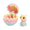 A set of six colorful dragon egg surprise figurines featuring pink, yellow, and blue translucent plastic.