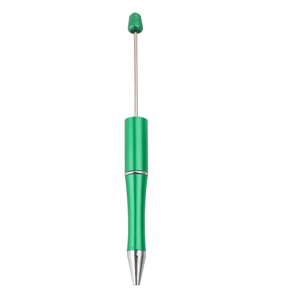A green beadable ballpoint pen with a silver tip and a green cap.