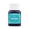 A dark blue bottle of Sky Blue textile fabric dye kit with a white cap.