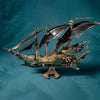 A detailed wooden puzzle model kit of a steampunk pirate ship with sails and rigging against a teal background.