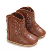 A pair of brown baby western booties with a soft non-slip sole.