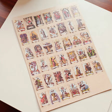 A sheet of vintage tarot card stickers featuring various illustrations and artwork.