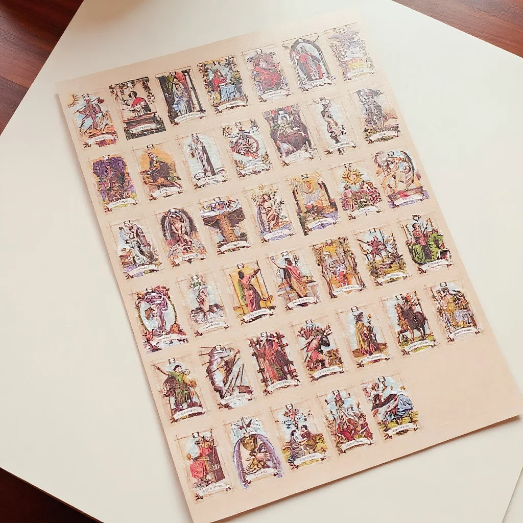 A sheet of vintage tarot card stickers featuring various illustrations and artwork.