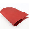 A sheet of wine red oil wax leather used for DIY craft projects.