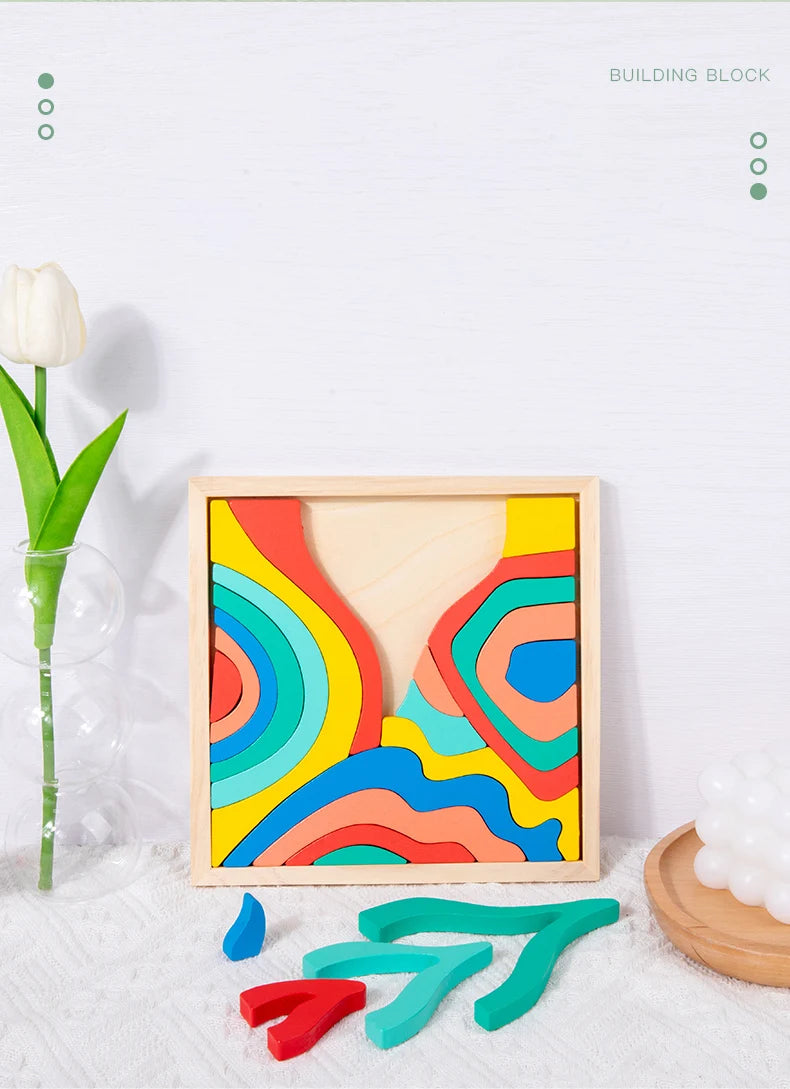 Rainbow wooden blocks puzzle pieces in various colors arranged on a white surface.