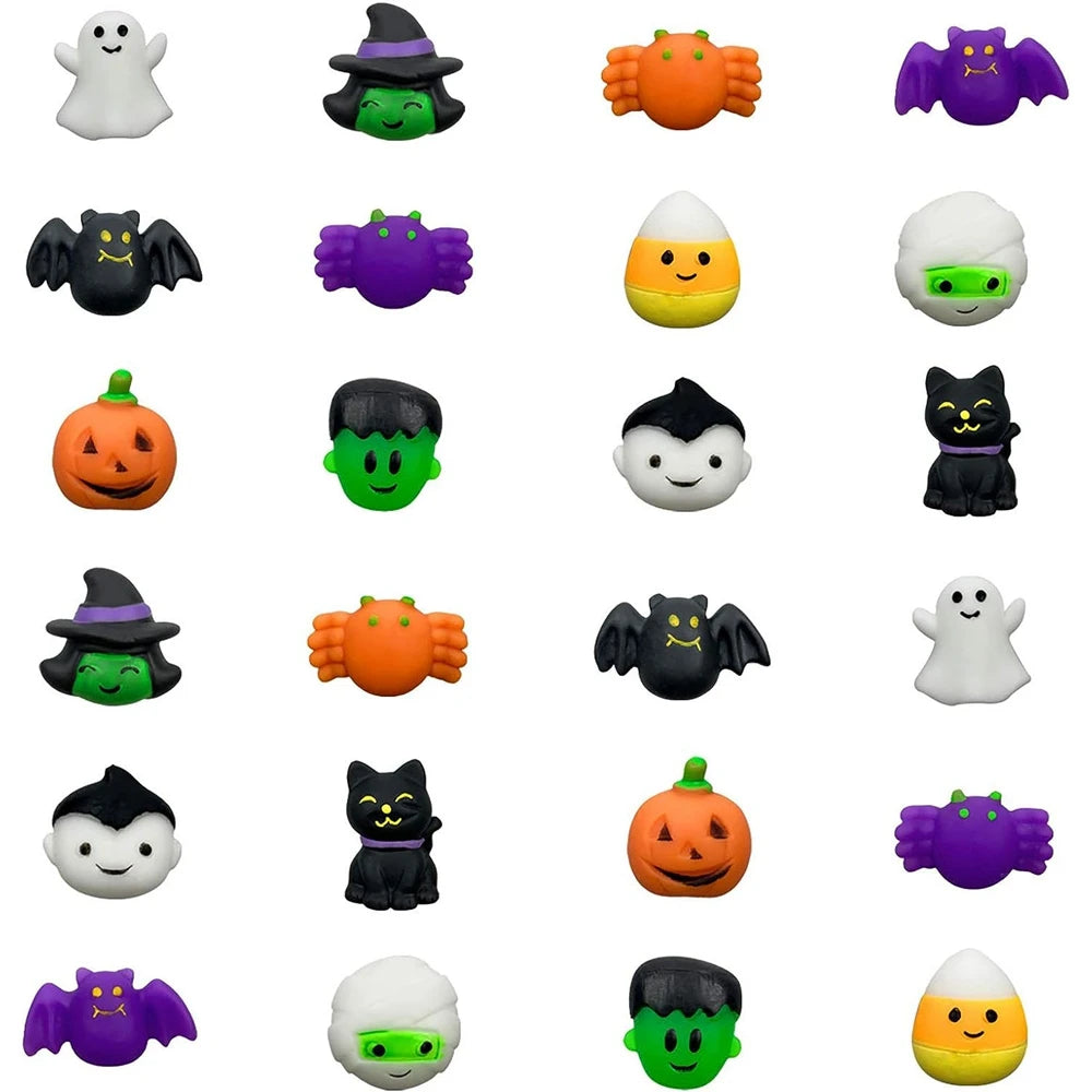 A collection of Halloween squishy stress relief toys including ghost, cat, and pumpkin mochi squishies in various colors.