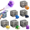 A set of plastic sea creatures and a gray grid-like toy for toddlers, including a purple octopus, orange fish, blue shark, an