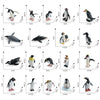 A set of realistic mini ocean animal figurines including a whale, shark, dolphin, turtle, and penguin in various poses.