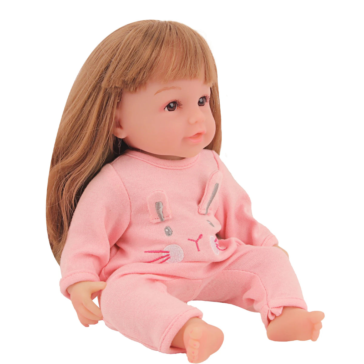 A light pink doll wearing a matching pink outfit with a bunny design.