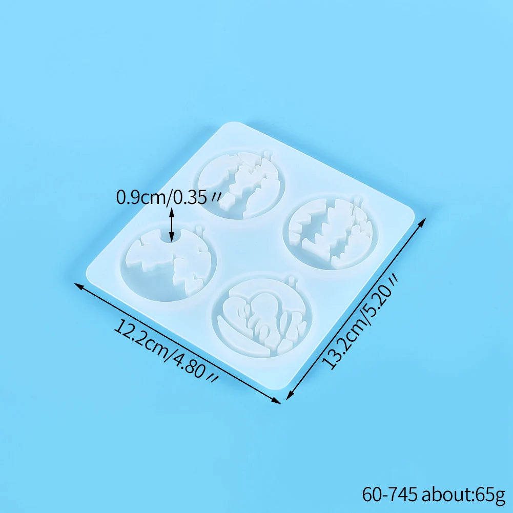 A white silicone mold tray with multiple circular cavities for jewelry and craft projects.