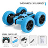 Blue 4WD stunt car with large wheels and spare parts list components shown on a white background