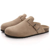 Tan suede cork mules with leather straps and arch support shown from the side.