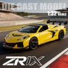 A yellow ZRX diecast model supercar in 1:32 scale on a racetrack.