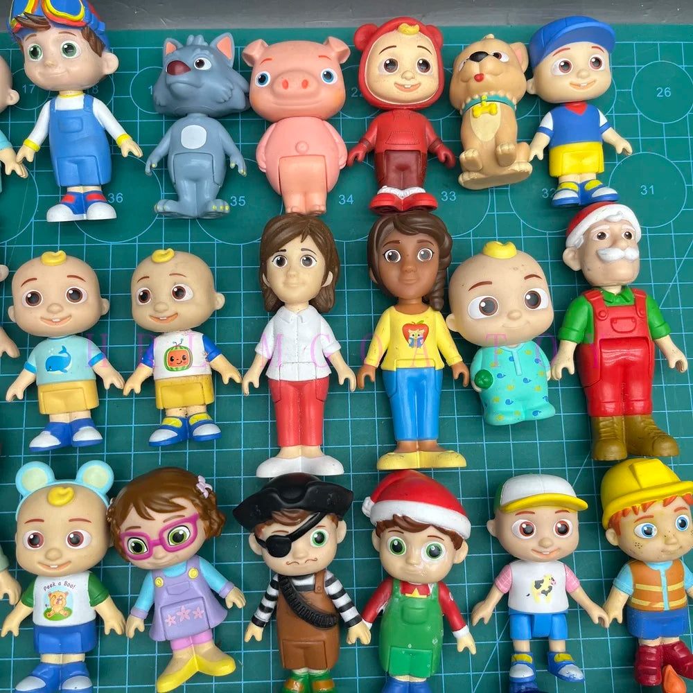 A collection of colorful PVC figurines depicting various cartoon characters.