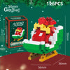 A set of 196 Christmas building blocks shaped like Santa and a reindeer, displayed next to its packaging.