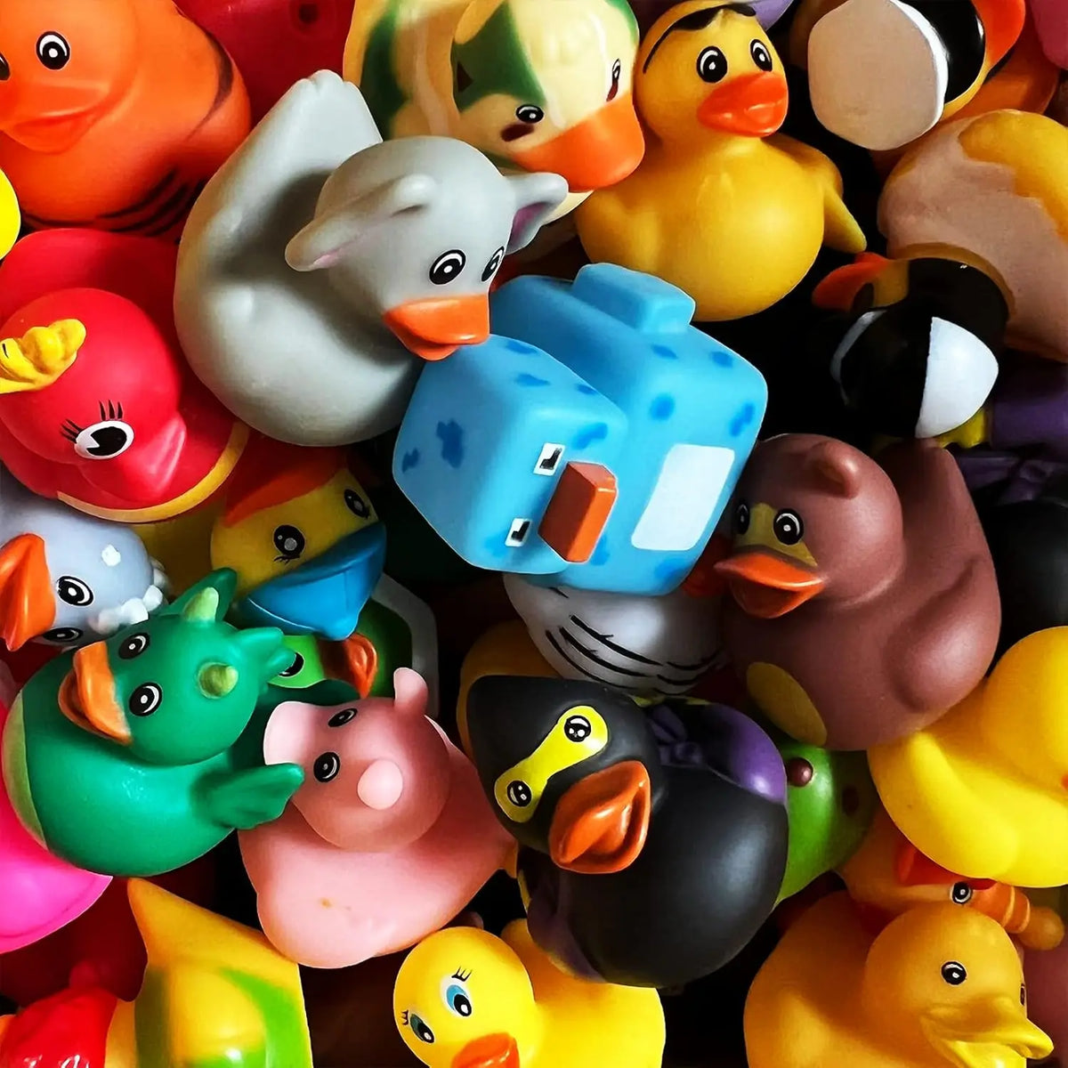 A collection of colorful rubber ducks in various shades and designs.