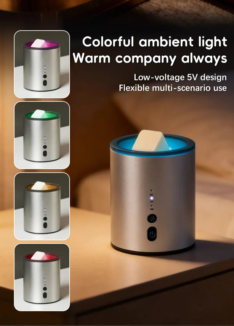 A silver electric wax melt heater with a blue glow is shown on a wooden surface.