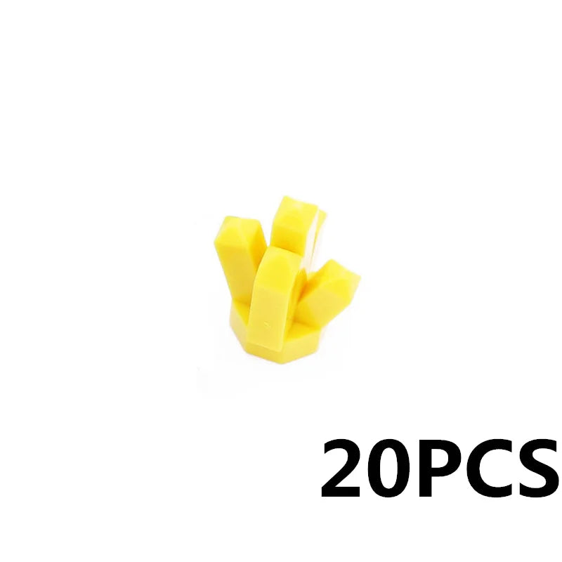 A small set of yellow building blocks shaped like treasure chest pieces.