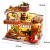A wooden 3D puzzle dollhouse kit depicting a magical city castle with detailed interiors and exterior features.