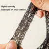 Close-up of black flat elastic silk lace shoelaces being stretched by a hand