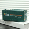 A dark green industrial storage box for EMS mail service with Chinese text and contact information resting on a white book.