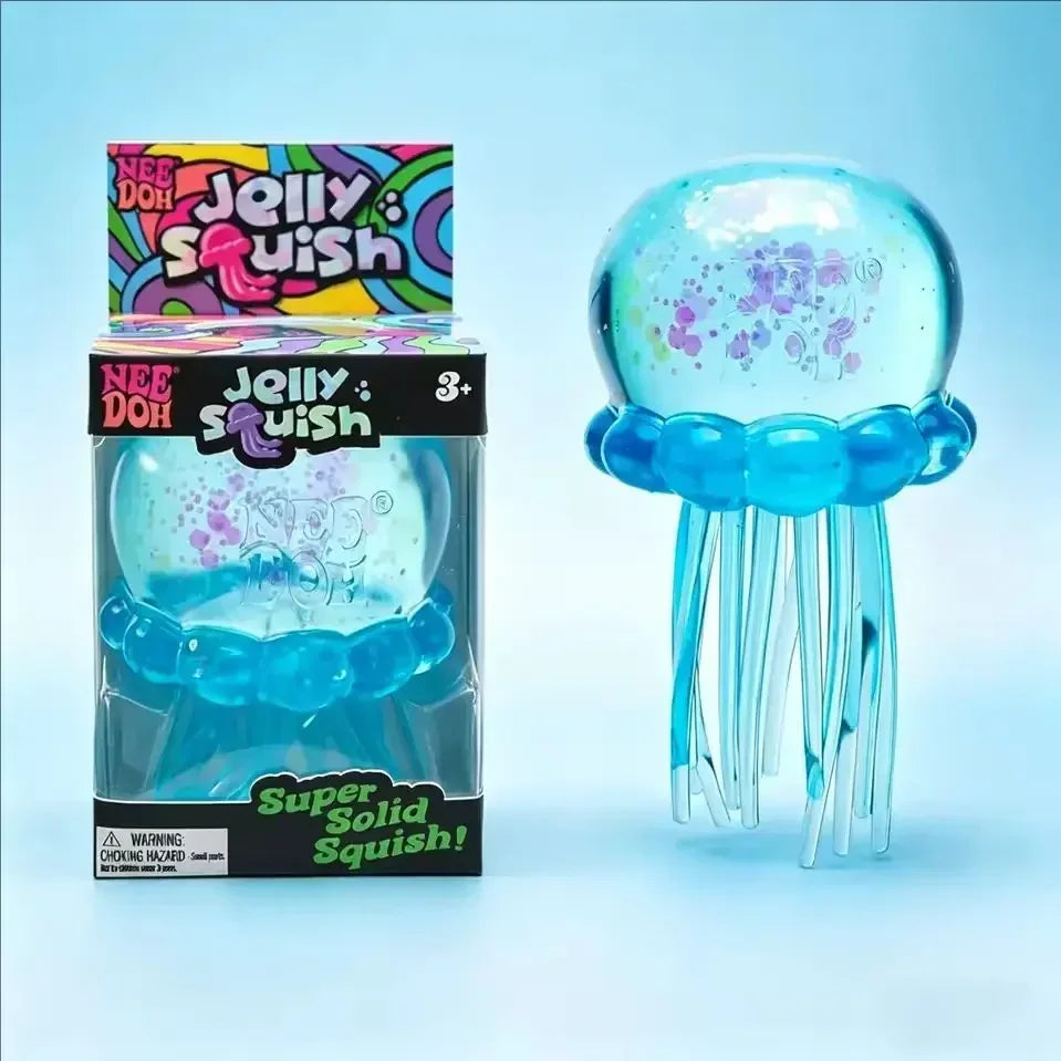 A clear blue jellyfish squish toy with tentacles and purple accents is displayed next to its packaging.