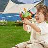 A young child is playing with an ant-shaped water blaster toy that shoots a long-range spray.
