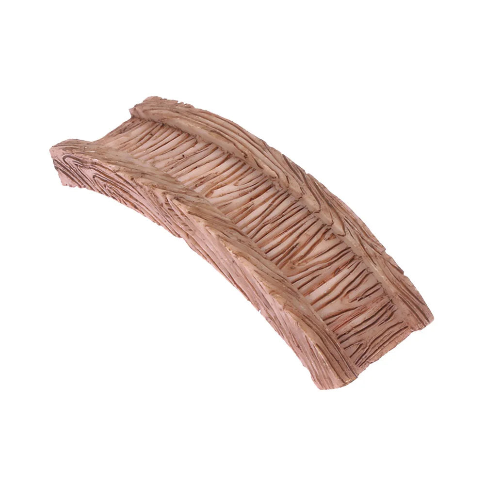 A carved wooden piece resembling a leaf or petal, used as a miniature animal figurine for fairy gardens.