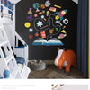 A close-up view of a black chalkboard wall sticker panel being written on with a silver pen.