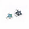 A set of black glass star spacer beads with various sizes and dimensions shown against a white background.