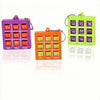 Three colorful mini tic tac toe puzzle games in purple, orange, and lime green on a white background.