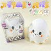 A white ghost squishy toy is shown next to its packaging and promotional text.